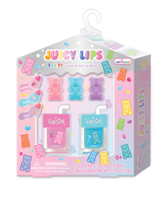 Packaged set of colorful lip oils with gummy bear design on a white background