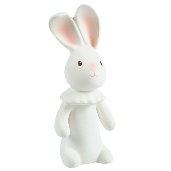 White rabbit figurine on a white background