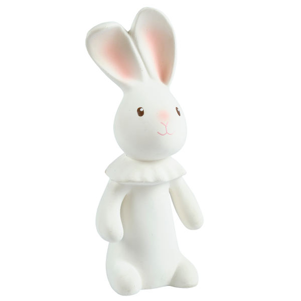 White rabbit figurine on a white background