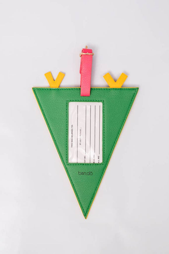 Green triangle-shaped luggage tag with colorful tabs on a light gray background