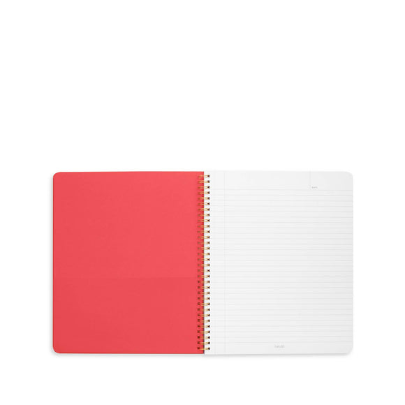 Notebook with red and white cover on a white background