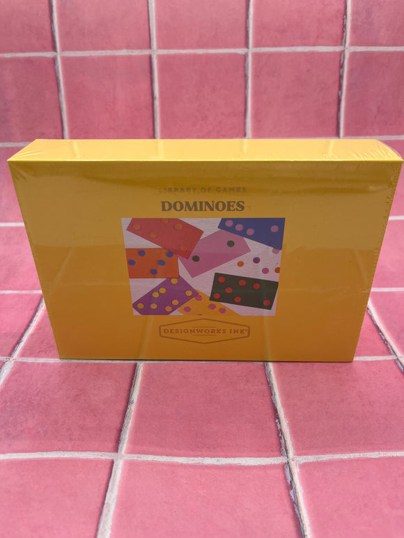 Yellow box that says, "Dominoes" with a picture of rainbow dominoes.