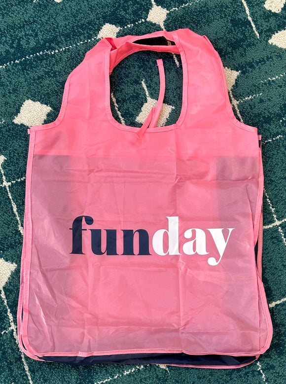 Pink tote that says, "funday" with fun in navy and day in white.
