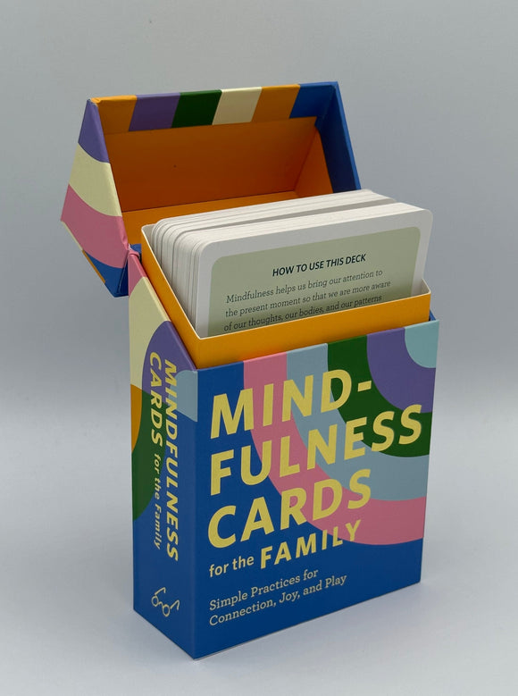 Rainbow box that says, "Mindfulness Cards for the Family Simple Practices for Connection, Joy, and Play" in yellow on the front and, "Mindfulness Cards for the Family" in yellow on the side.