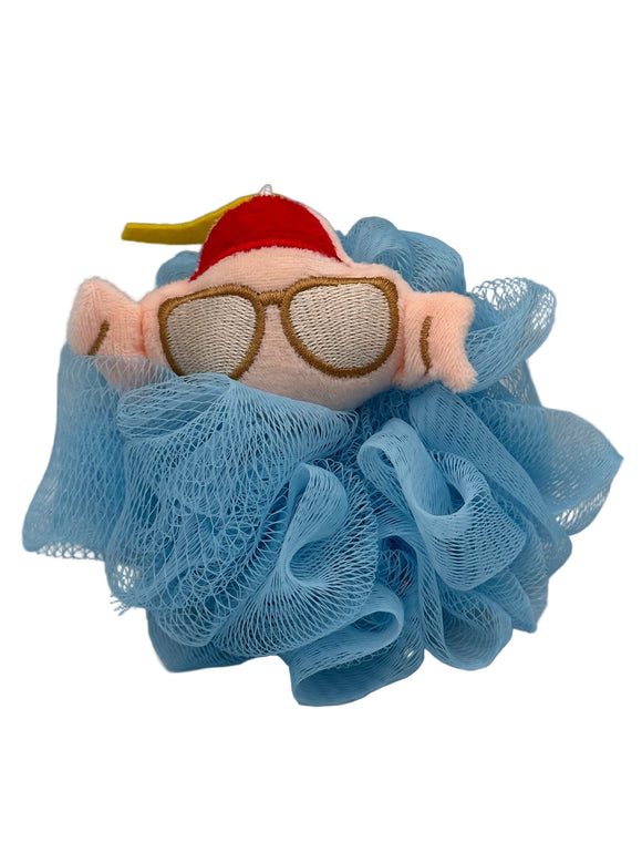 A blue loofa with a pinkish/tan raw turkey plush wearing brown glasses and a red hat.