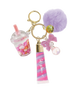 Keychain with a boba cup, lip gloss, and pom-pom on a white background