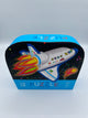 The rocket Crocodile Creek 12 piece puzzle. The box is light blue, and the front is navy blue with a rocket ship on the front.