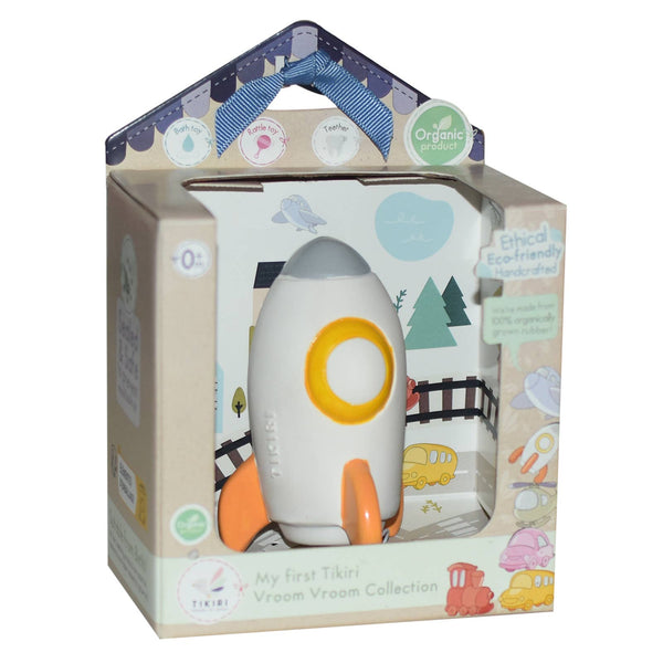 Children's toy rocket in a colorful packaging box on a white background