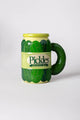 Green pickle-shaped mug with 'Pickles Crunchy Dill' text on a white background