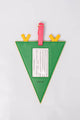 Green triangle-shaped luggage tag with colorful tabs on a light gray background