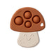 Mushroom Itzy Pop that has a rust color top with 4 popping bubbles and a tan color stem with that has a smiling face.
