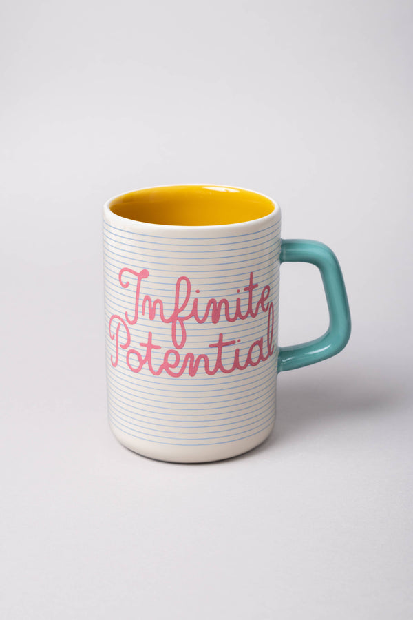 Mug with 'Infinite Potential' text on a white background
