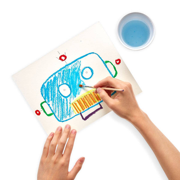 Child's hand drawing a colorful illustration of a toy car on a white sheet with a small bowl of blue water nearby.