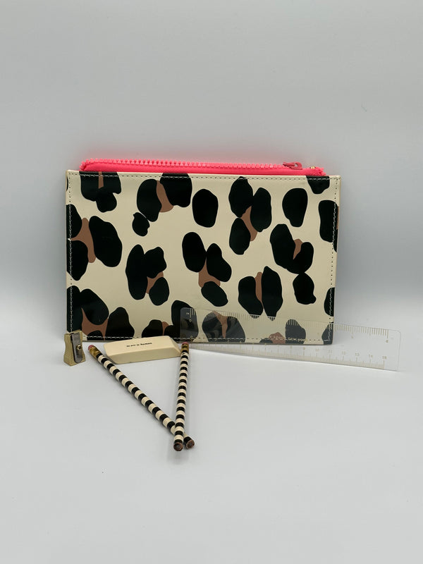 Tan, black, and brown cheetah print pencil pouch with a neon pink zipper. There is a small pencil sharpener, a tan eraser, two tan and black strip pencils, and a clear ruler with gold markings.