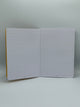 The white, lined pages on the inside of the Ban-do fruity notebooks.